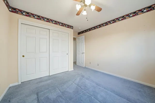 a bathroom with a tub and shower