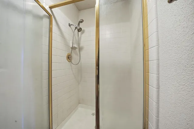 a backyard of a house with barbeque oven fire pit and outdoor seating