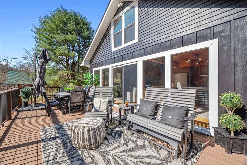 192 Mountain Laurel Road Emlenton, PA 16373 - Photo 18 of 50 This sprawling composite deck with vinyl railing has room for an eating area and lounge area. (Deck patio furniture is excluded)