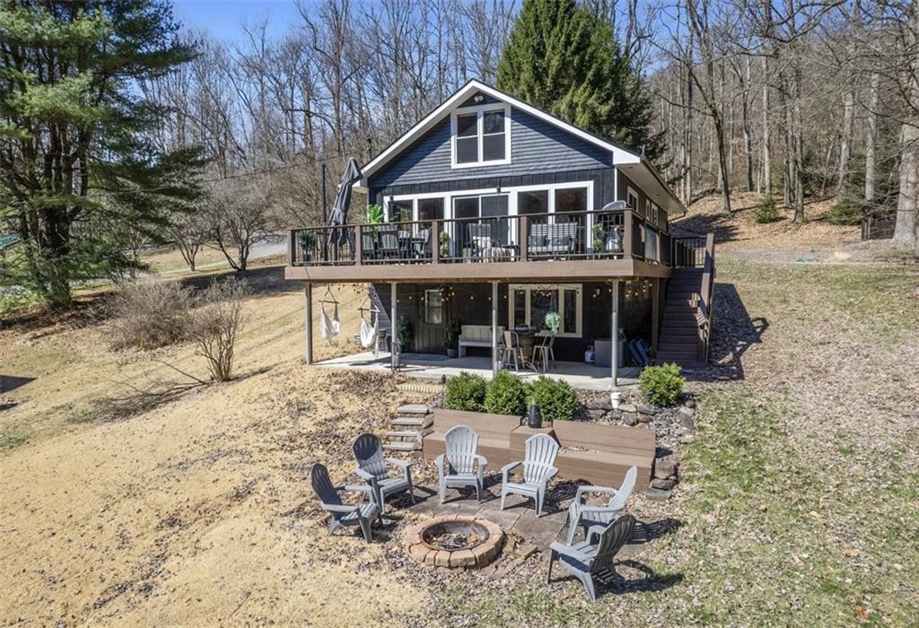 192 Mountain Laurel Road Emlenton, PA 16373 - Photo 2 of 50 Welcome to this charming retreat where peace and tranquility abound. Incredible wrap around composite decking!