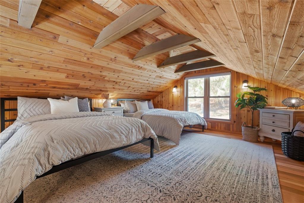192 Mountain Laurel Road Emlenton, PA 16373 - Photo 21 of 50 This cozy loft is enhanced by the wood plank ceiling and wood beam detail. Great place for a home office or a 4th bedroom like it is set up currently.