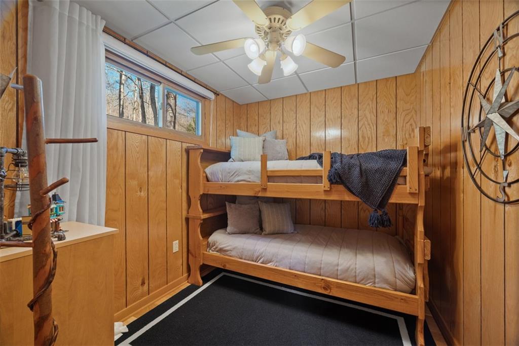 192 Mountain Laurel Road Emlenton, PA 16373 - Photo 32 of 50 A second bedroom on the main level comes with 2 bunk beds and a ceiling fan to keep things cool all summer.