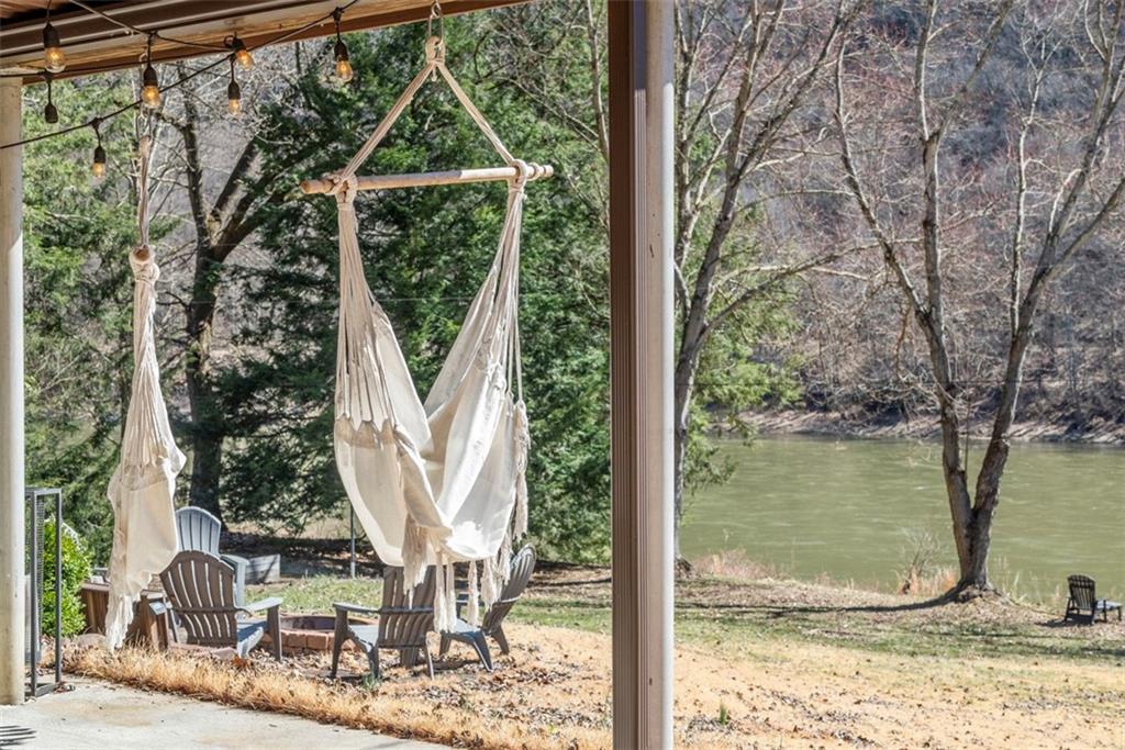 192 Mountain Laurel Road Emlenton, PA 16373 - Photo 37 of 50 Swing away in the hanging hammock chairs while you listen to the sounds of the rolling river.