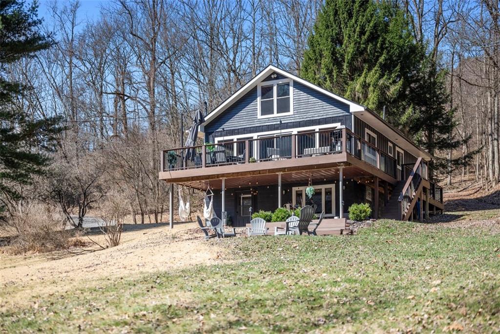 192 Mountain Laurel Road Emlenton, PA 16373 - Photo 40 of 50 The sprawling yard that sits between the home and the river provides space for outdoor games and more.