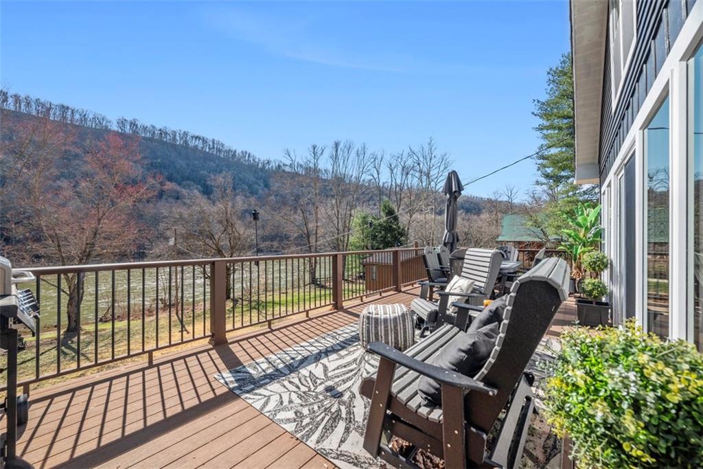 192 Mountain Laurel Road Emlenton, PA 16373 - Photo 4 of 50 Oh, isn't this the life. Sit back with your glass of summer lemonade and take in the sun and views of the waterfront. The ridge on the other side of the river is just gorgeous!