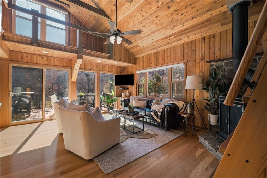 192 Mountain Laurel Road Emlenton, PA 16373 - Photo 8 of 50 Inside you will find a stunning vaulted cedar plank ceiling and walls that create a warm refuge.