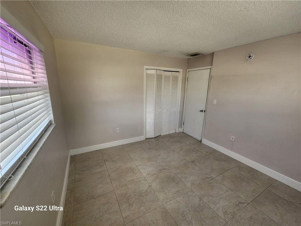 3325 Airport Road North, Unit N8 Naples, FL 34105 - Photo 12 of 22 a view of an empty room