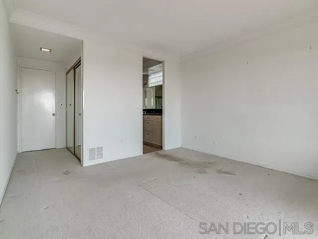 an empty room with an entryway