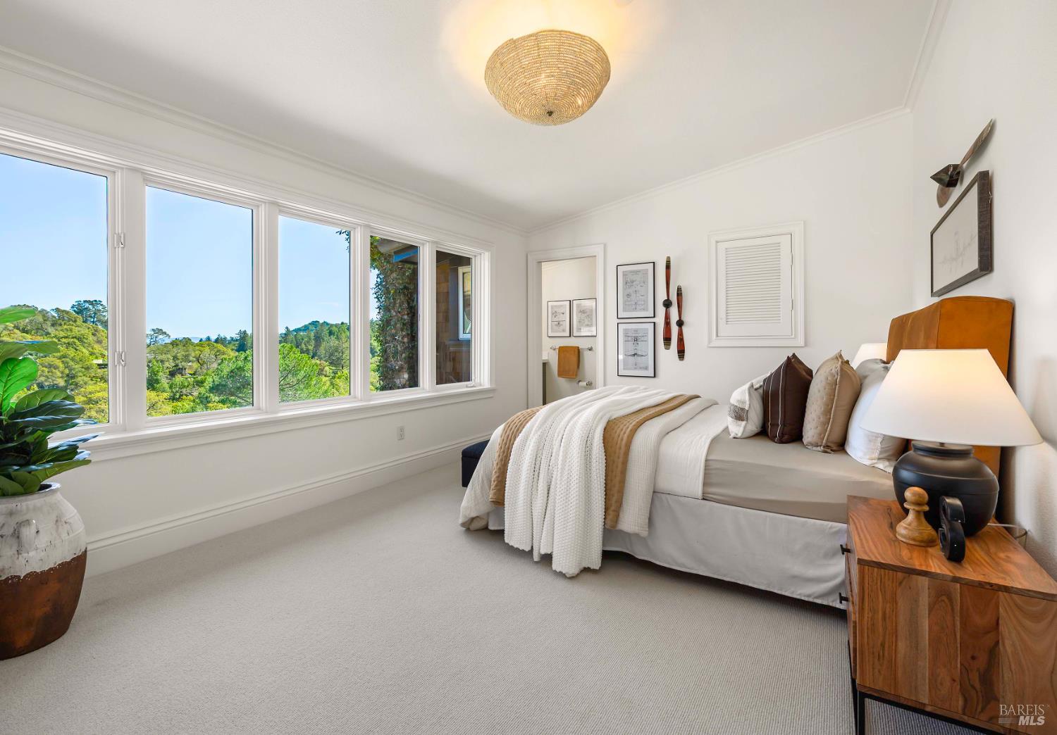 33 Acorn Way Kentfield, CA 94904 - Photo 28 of 58 a spacious bedroom with a bed and window