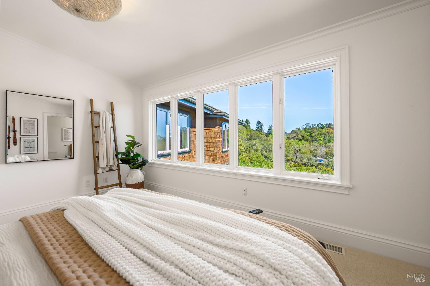 33 Acorn Way Kentfield, CA 94904 - Photo 29 of 58 a spacious bedroom with a bed and a window