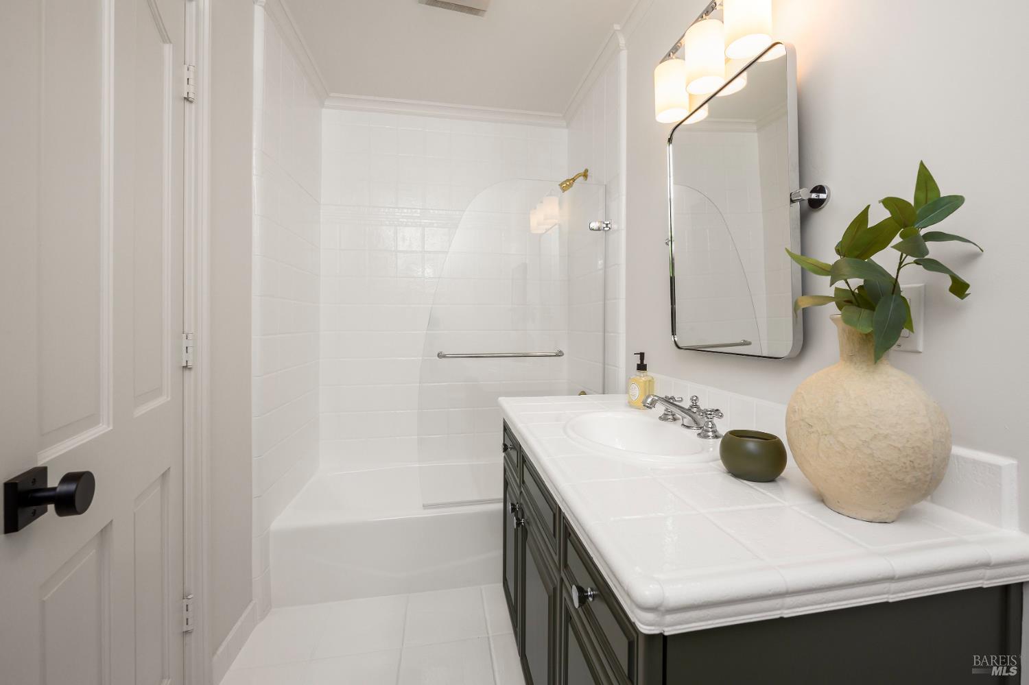 33 Acorn Way Kentfield, CA 94904 - Photo 32 of 58 a bathroom with a sink and a mirror