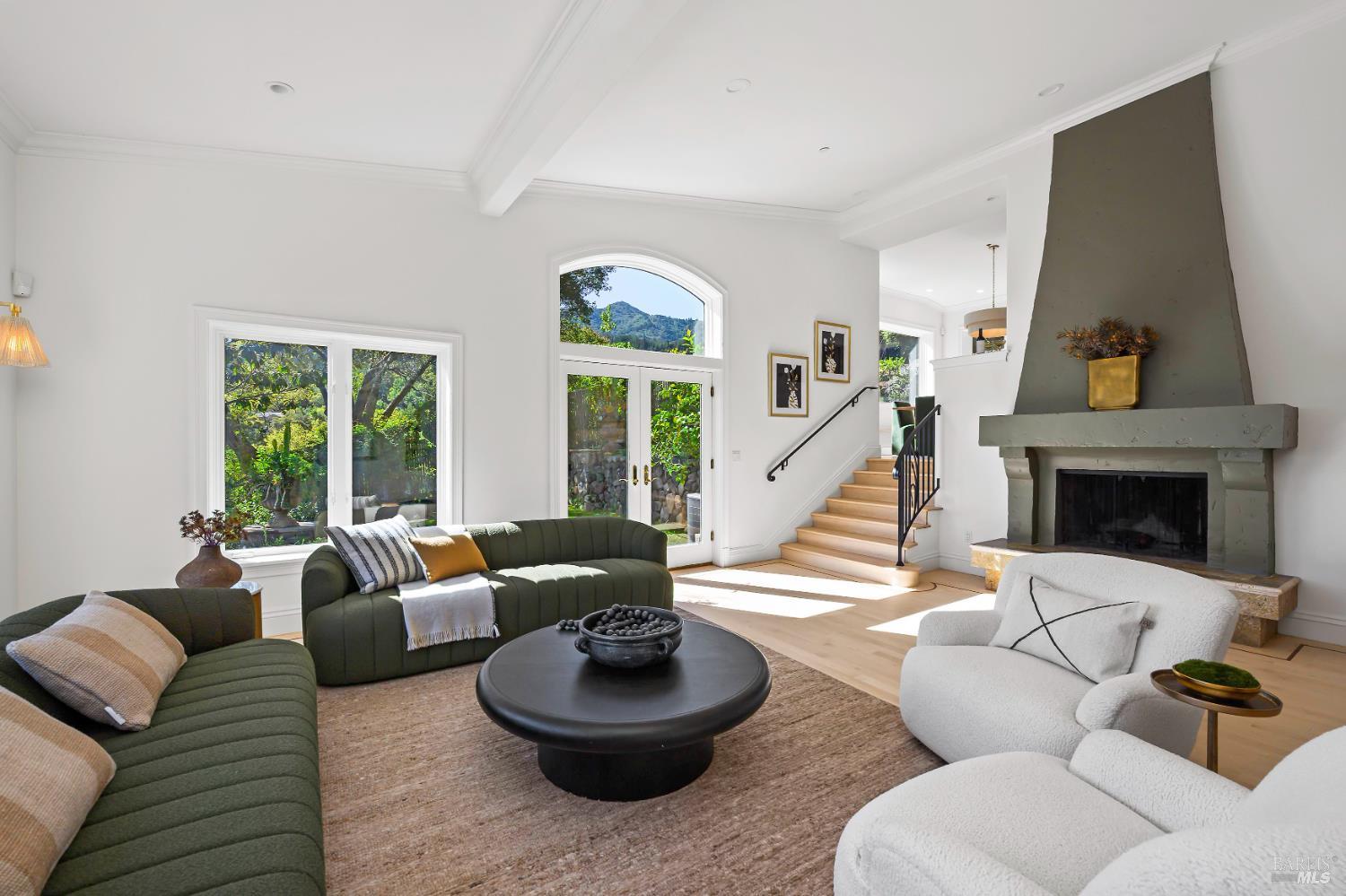 33 Acorn Way Kentfield, CA 94904 - Photo 4 of 58 a living room with furniture and a fireplace