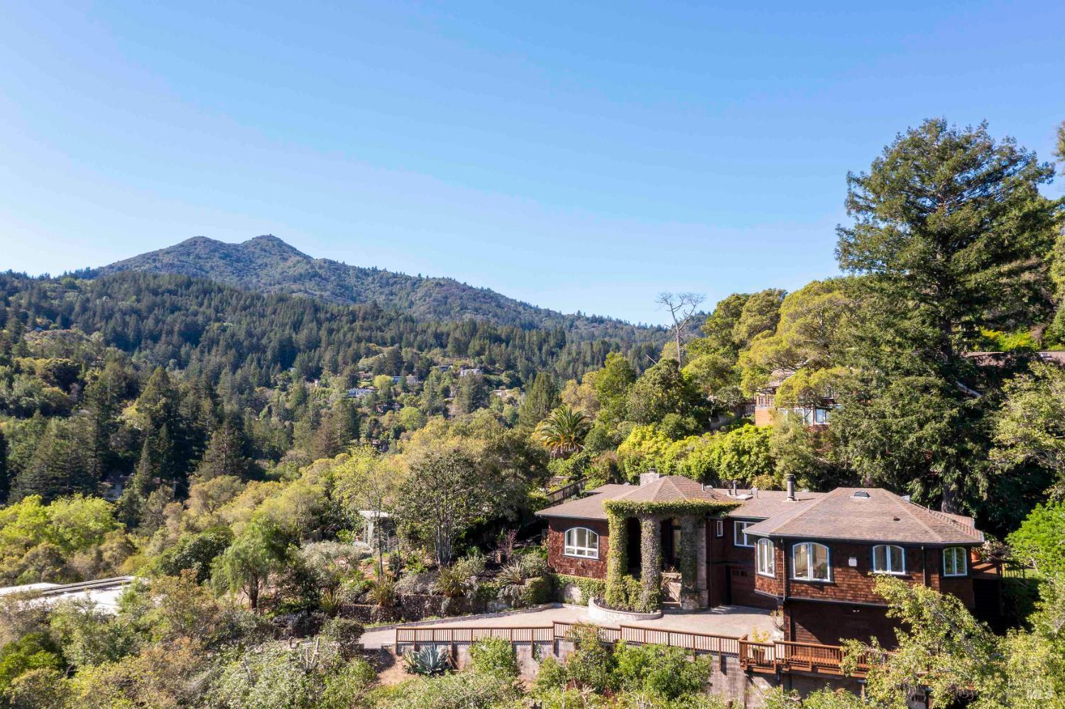 33 Acorn Way Kentfield, CA 94904 - Photo 54 of 58 a front view of a house with a yard and mountain