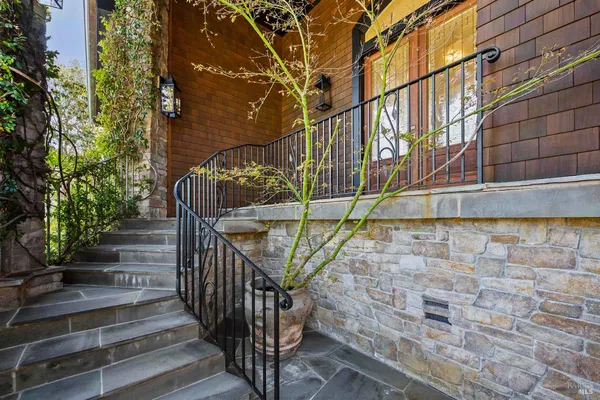 a view of entryway with wooden floor