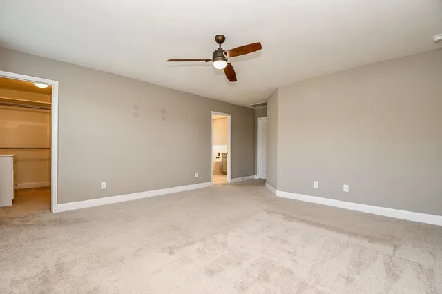 a bathroom with a double vanity sink mirror bathtub and shower