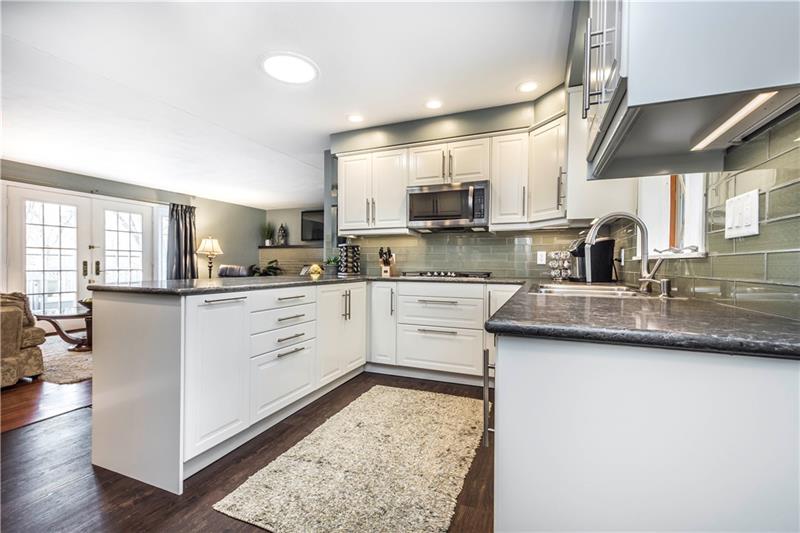 2987 Brodhead Road Aliquippa, PA 15001 - Photo 5 of 25 NEWER remodeled Kitchen, gorgeous! Granite counters, glass backplash.