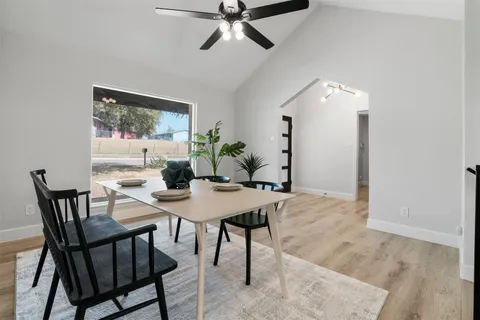 a view of a dining room with furniture