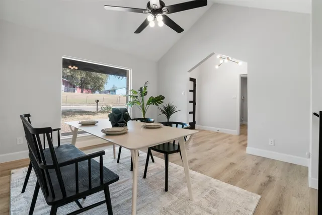 a view of a dining room with furniture