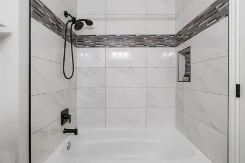 a bathroom with a bathtub