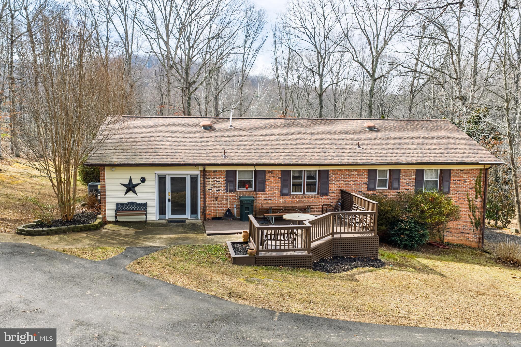 a view of a house with large outdoor space