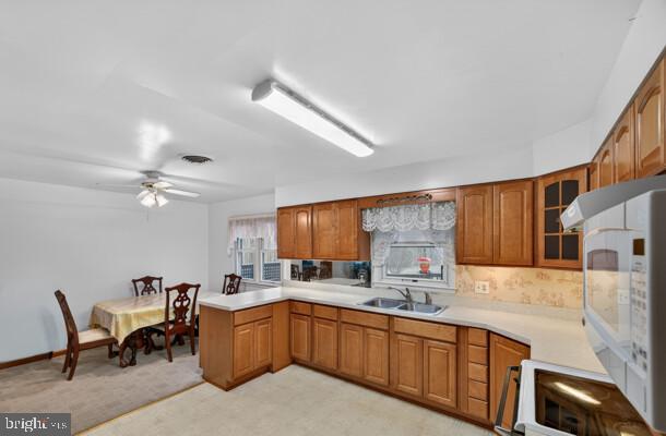 2130 Leon Road Culpeper, VA 22701 - Photo 15 of 47 a kitchen with granite countertop a sink cabinets stainless steel appliances and a counter top space