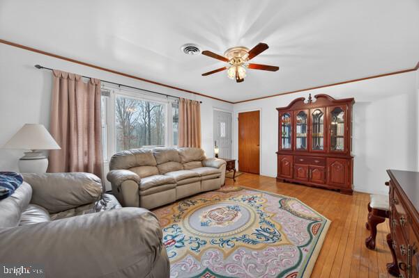 2130 Leon Road Culpeper, VA 22701 - Photo 18 of 47 a living room with furniture a rug and a large window