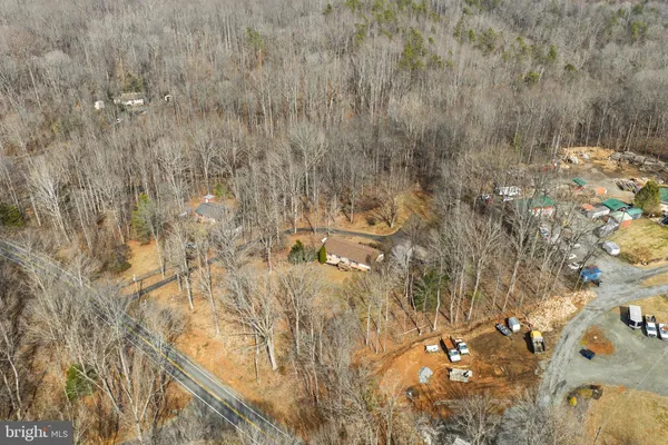 a view of a house with large outdoor space