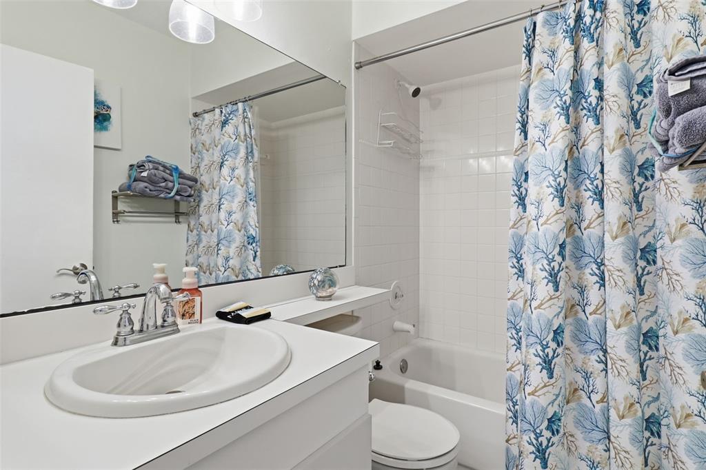 7324 Islander Lane Hudson, FL 34667 - Photo 24 of 35 a bathroom with a sink toilet and shower