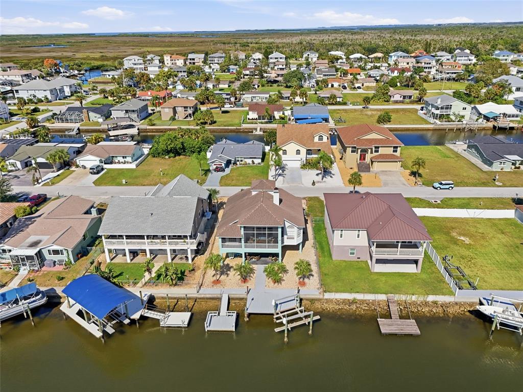 7324 Islander Lane Hudson, FL 34667 - Photo 6 of 35 an aerial view of residential houses with outdoor space