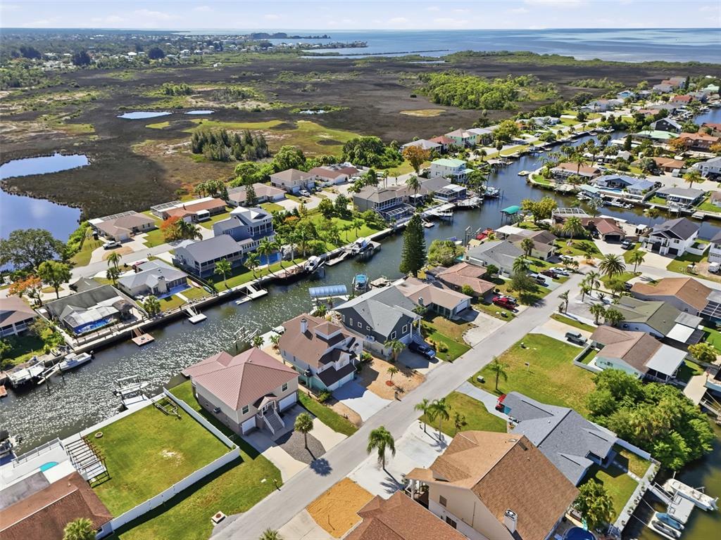 7324 Islander Lane Hudson, FL 34667 - Photo 7 of 35 an aerial view of residential houses with outdoor space