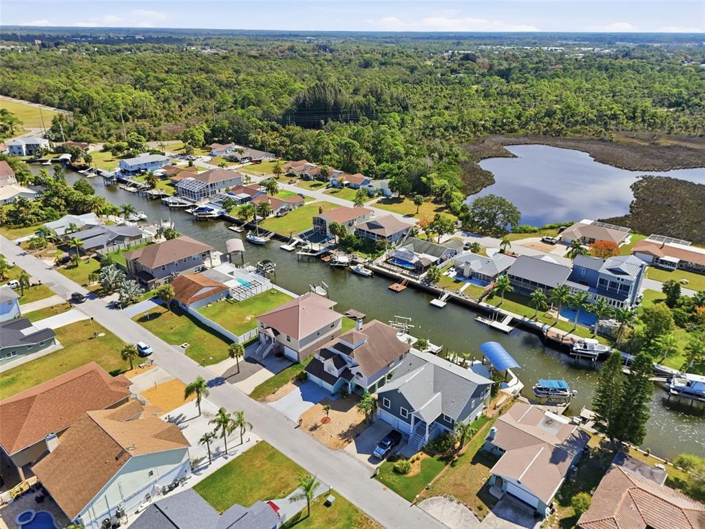 7324 Islander Lane Hudson, FL 34667 - Photo 8 of 35 an aerial view of residential houses with outdoor space