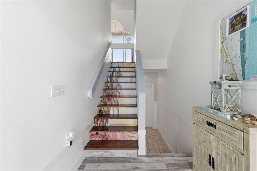 7324 Islander Lane Hudson, FL 34667 - Photo 9 of 35 a view of entryway and hall with wooden floor