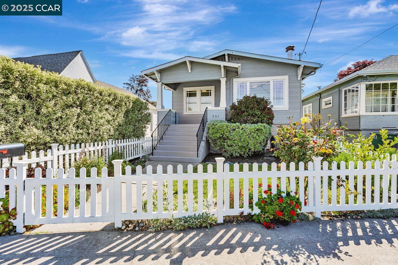 2315 Acton Street Berkeley, CA 94702 - Photo 1 of 1 a front view of a house with a garden