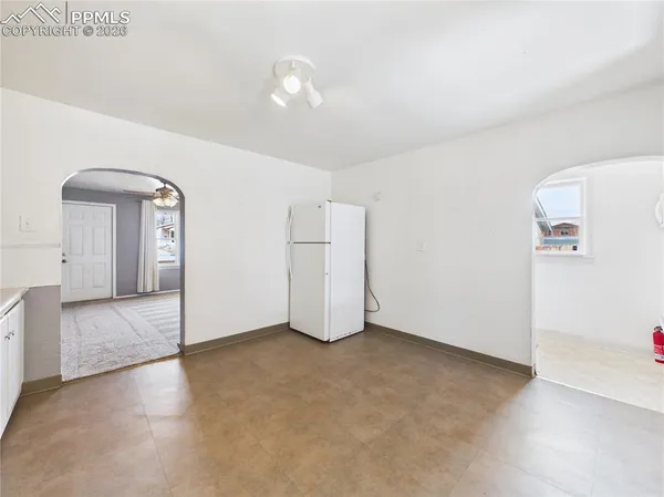 a view of a livingroom with wooden floor