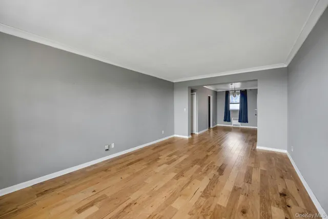 a view of livingroom with wooden floor