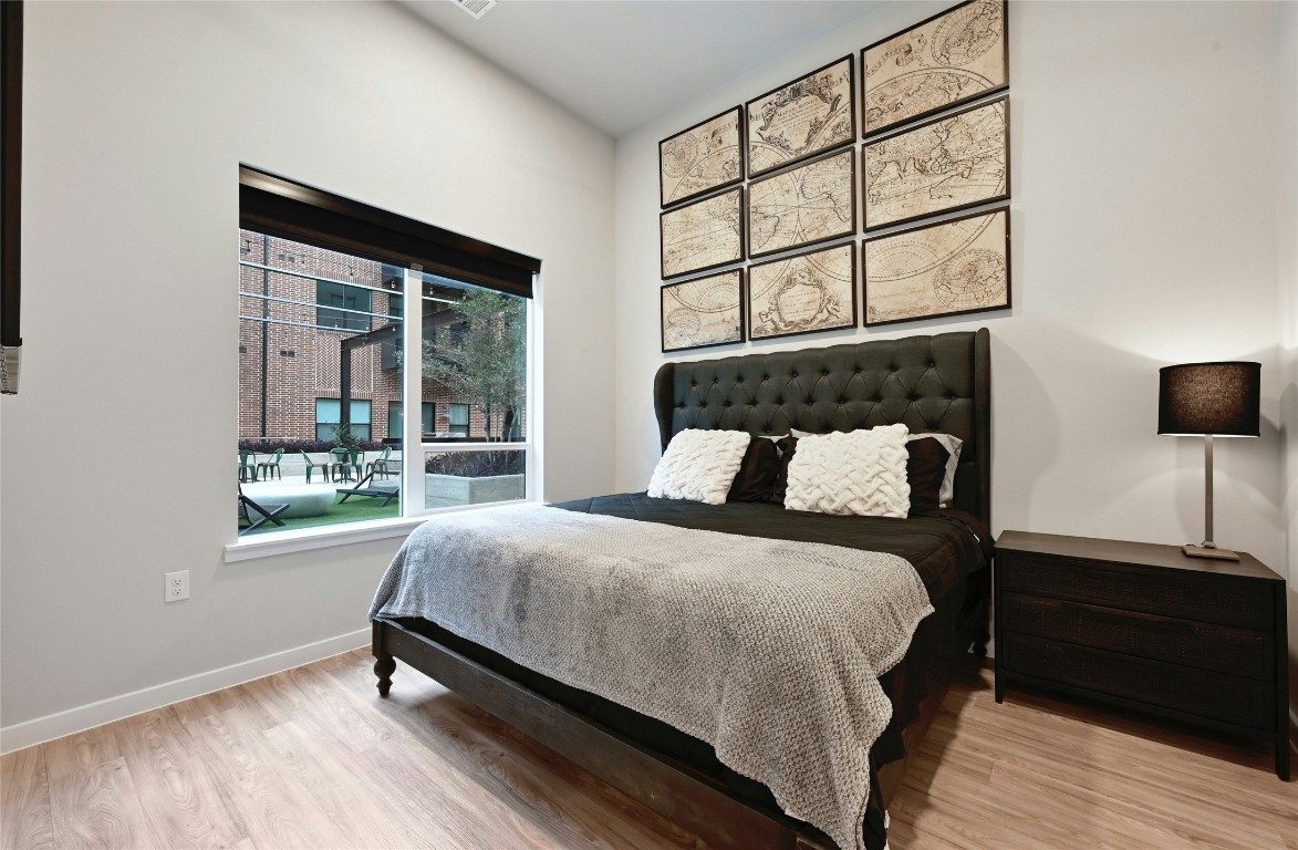 4510 Terry-O Lane, Unit 138 Austin, TX 78745 - Photo 12 of 40 a bedroom with a bed and a window