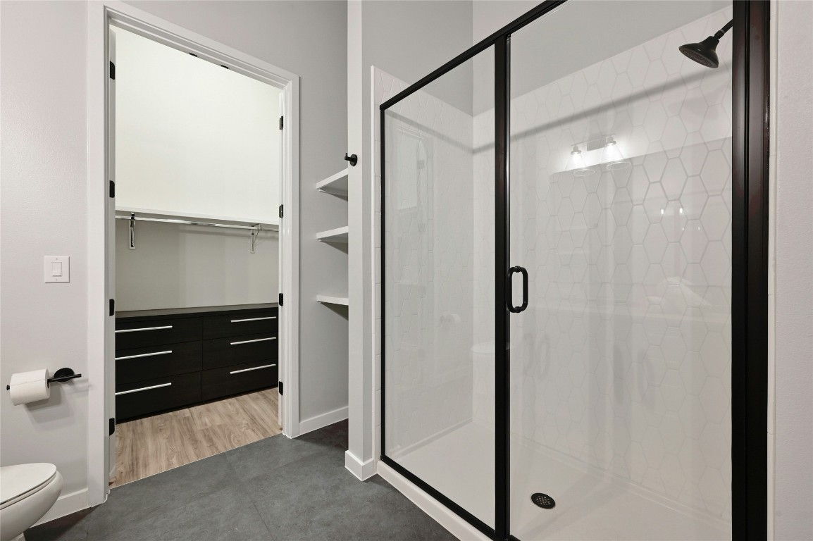 4510 Terry-O Lane, Unit 138 Austin, TX 78745 - Photo 15 of 40 a bathroom with a shower and a tub