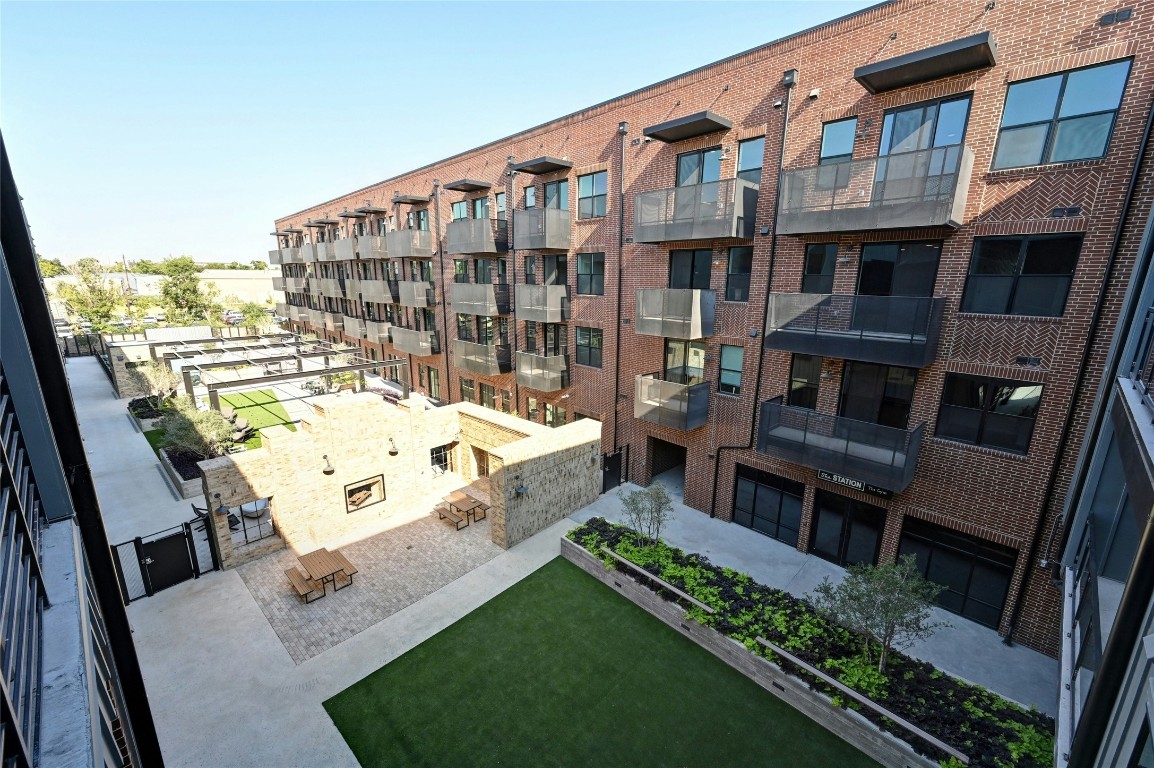 4510 Terry-O Lane, Unit 138 Austin, TX 78745 - Photo 24 of 40 a view of building with roof deck