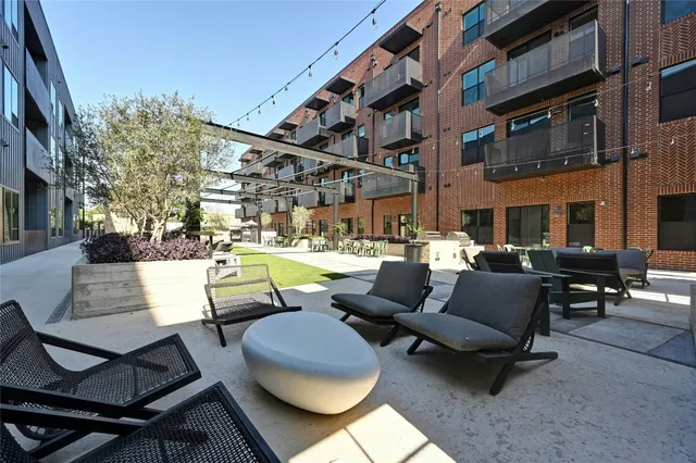 a outdoor living space with patio furniture and a potted plant