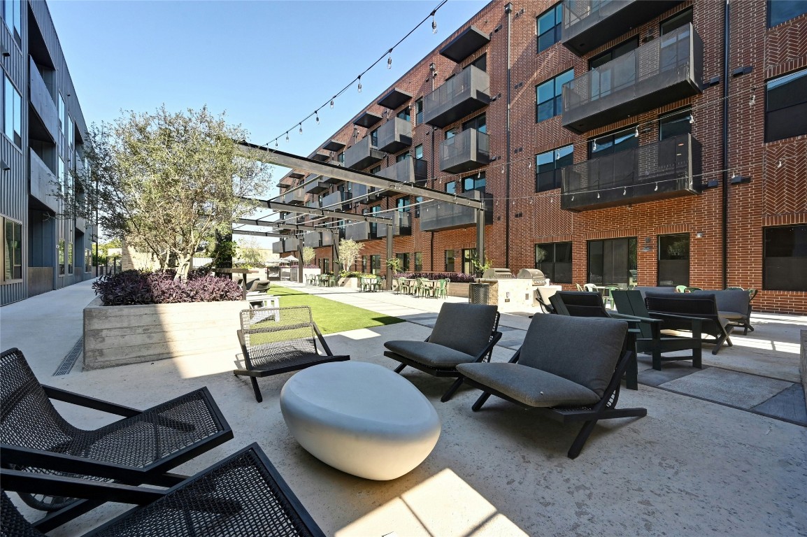 4510 Terry-O Lane, Unit 138 Austin, TX 78745 - Photo 28 of 40 a outdoor living space with patio furniture and a potted plant