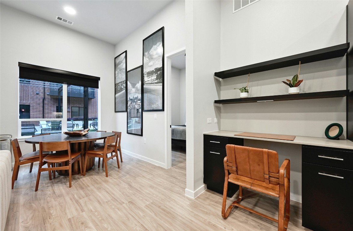 4510 Terry-O Lane, Unit 138 Austin, TX 78745 - Photo 10 of 40 a dining room with furniture and wooden floor