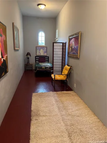 a bathroom with a sink toilet and a mirror