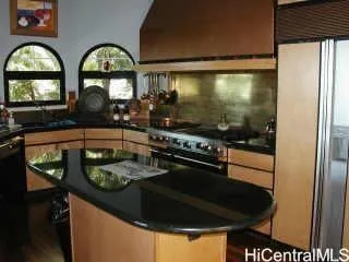 a bed room with a bed and a large window