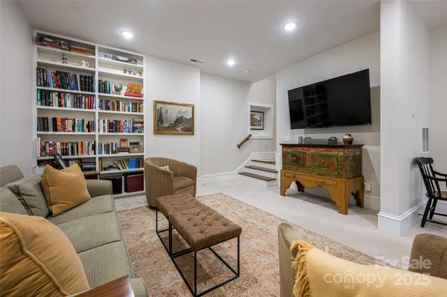 a living room with furniture and a couch