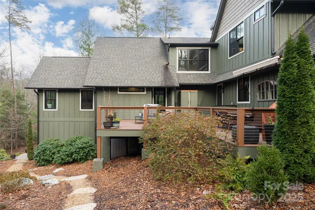 a view of a garden with sitting area