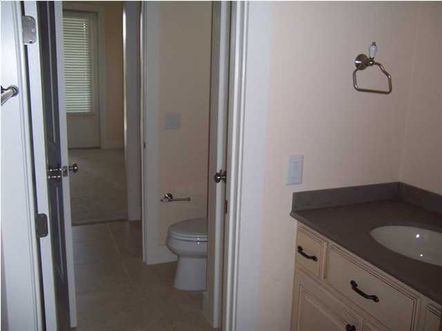 27 Pompano Ct Inlet Beach Inlet Beach, FL 32461 - Photo 16 of 23 a bathroom with a granite countertop sink toilet and shower