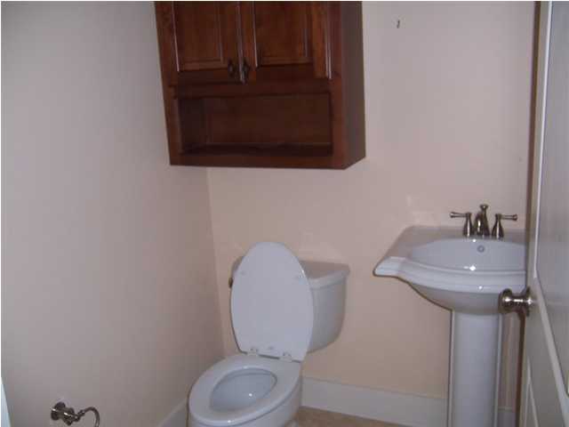 27 Pompano Ct Inlet Beach Inlet Beach, FL 32461 - Photo 17 of 23 a bathroom with a toilet a sink and mirror