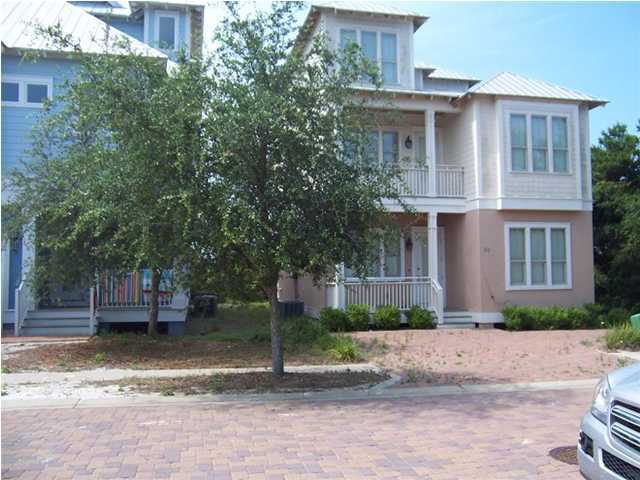 27 Pompano Ct Inlet Beach Inlet Beach, FL 32461 - Photo 3 of 23 a front view of a house with a yard