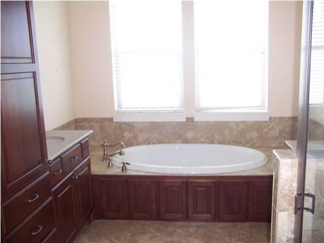 27 Pompano Ct Inlet Beach Inlet Beach, FL 32461 - Photo 5 of 23 a bathroom with a bathtub and a sink