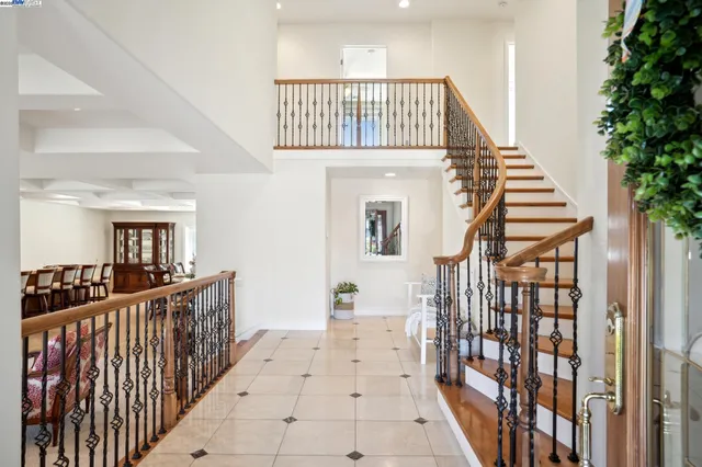 a view of entryway with stairs